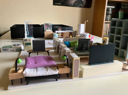 Borgerne blev bedt om at bygge deres fremtidige hjem ved hjælp af miniaturemøbler.