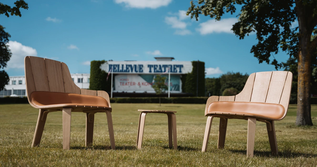 The chair also comes in a mirrored version, allowing the creation of a shared space for dialogue and community. The footstool can also serve as a side table for the chairs. Photo: Mathias Rasmussen.