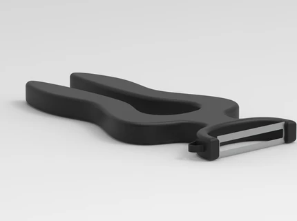 Skræller by Hedvig Djurhuus is a vegetable peeler with a special grip designed to support individuals with weaker wrists or arthritis, allowing them to use less effort when peeling vegetables.